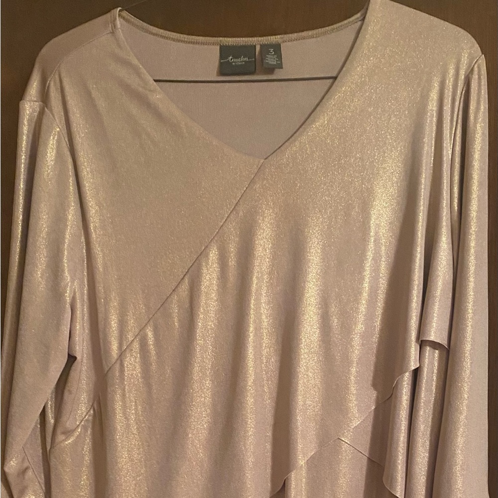 Gold shimmer pullover blouse with water fall effect in front.
